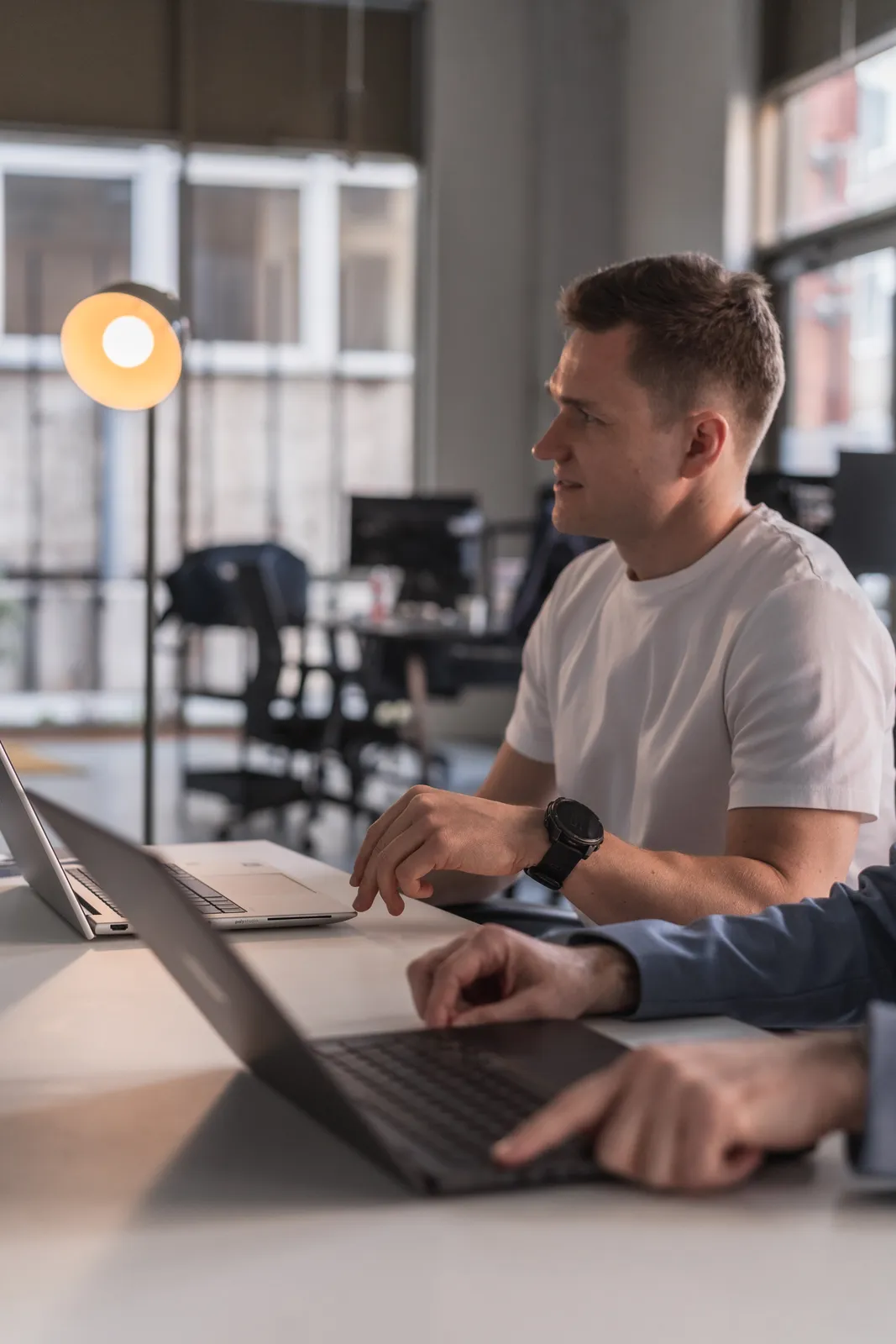 The instadial team at work at their laptops in the office